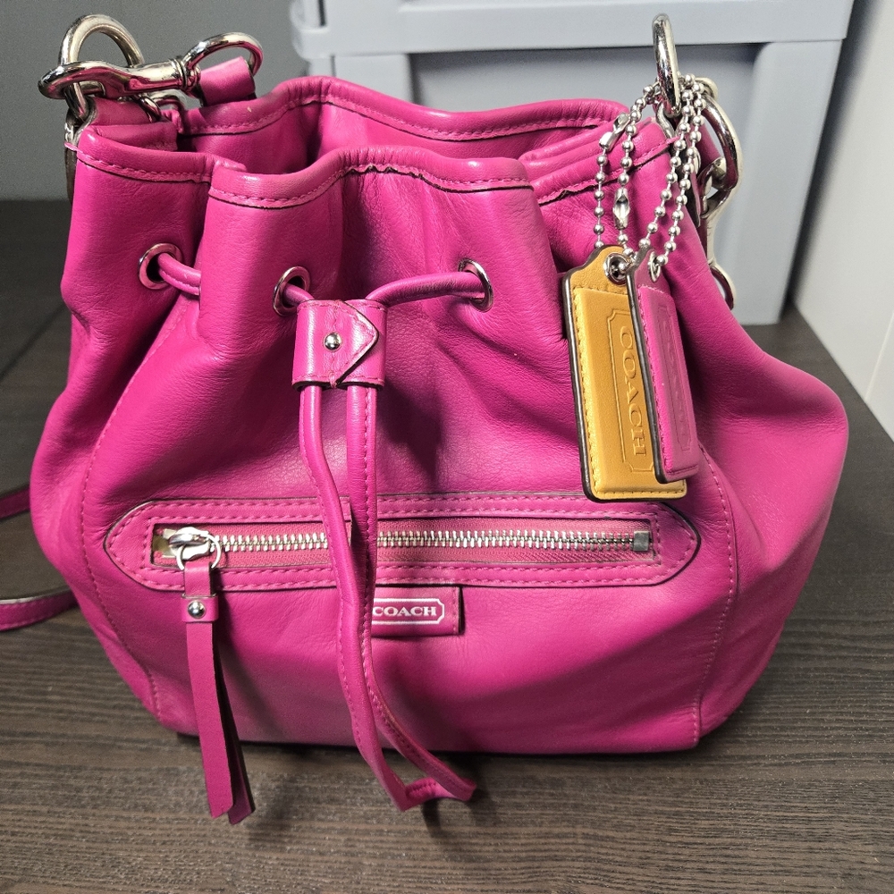 Coach Pink Shoulder Bag with Drawstring Closure and Silver Accents